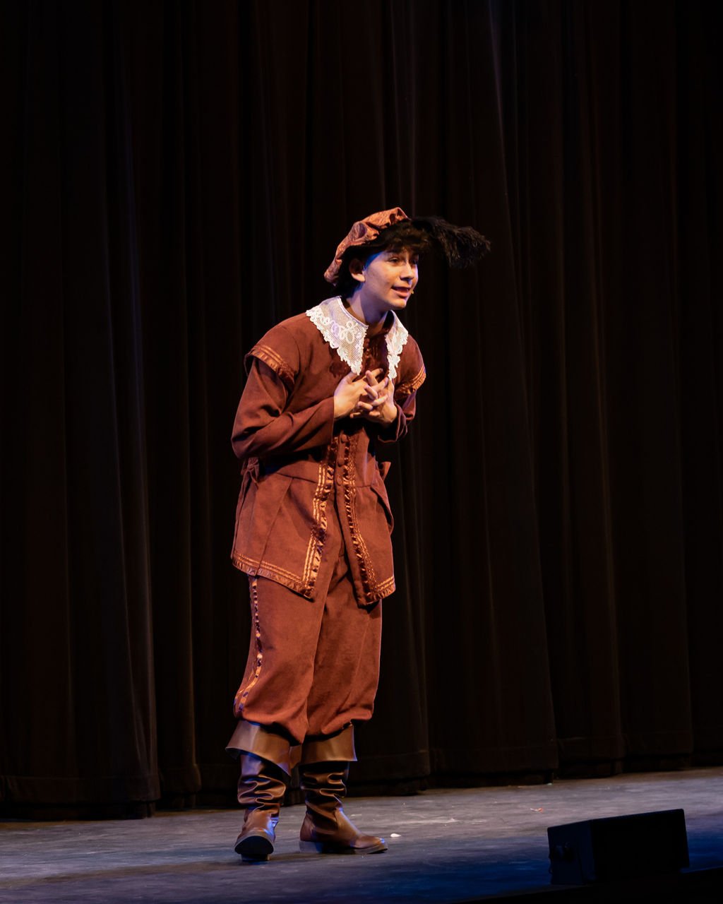 Drop a show photo — young cast mid-performance